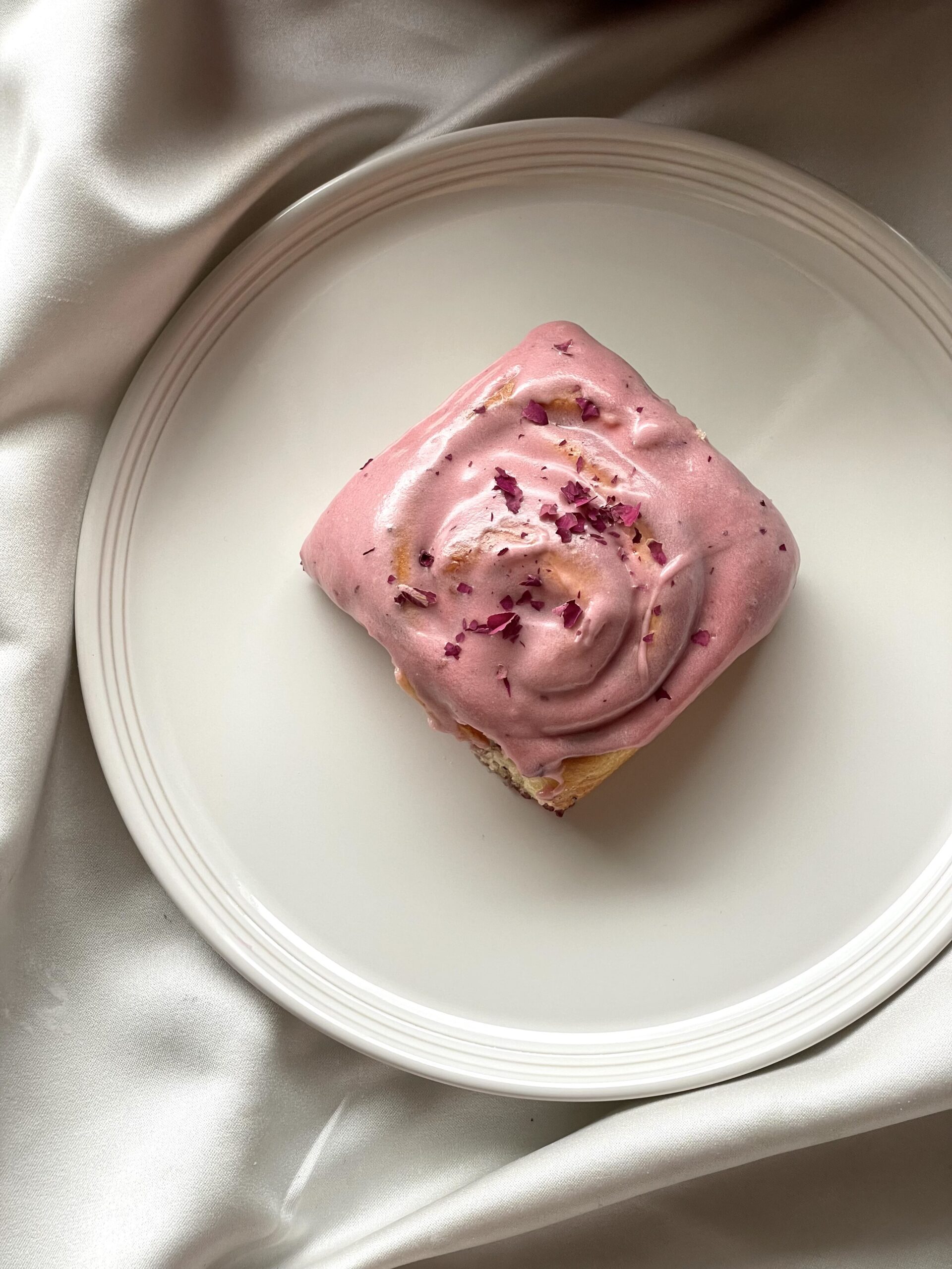 Berry rolls with frosting